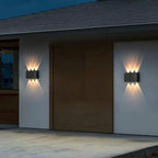 industrial wall light mounted on exterior wall with symmetrical light distribution